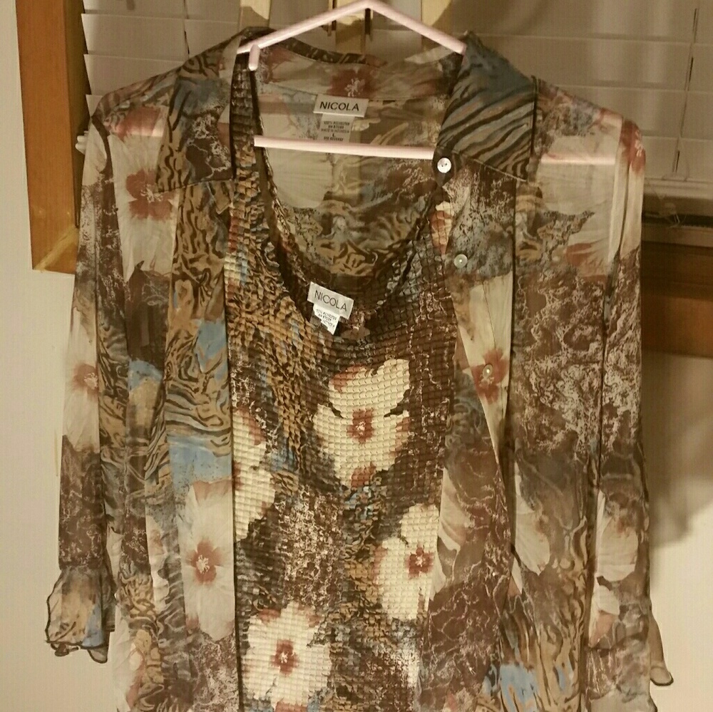 Blouse with camisole included.